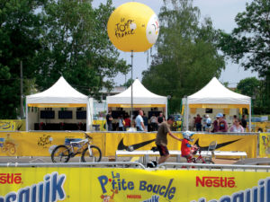 Auxiliary tents for the fan zone during the Tour de France cycling competition are set up at every departure and arrival in cities along the route. Photo courtesy of Damien Vieille, Ins’TenT Industries.