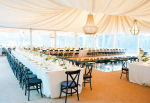 Classic draping, crystal chandeliers and sheer fabrics that impart a sense of openness and light complement the rustic chic trend that remains popular with wedding clients. Event design and planning: Kathleen Deery Designs and Alison Events. Photo courtesy of Classic Party Rentals. Photo: Jose Villa Photography