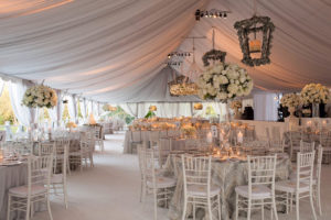 For an October 2014 wedding at Cheekwood Botanical Gardens in Nashville, Tenn., Music City Tents and Events installed a 50-by-105-foot tent with a 4-foot sub floor and custom white railing. Photo: Music City Tents and Events