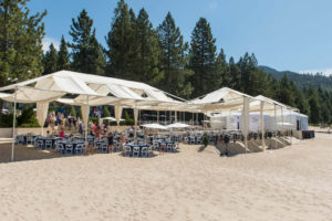 Sand had to be leveled at the site on Lake Tahoe before installation could commence. Photo courtesy of Camelot Party Rentals.
