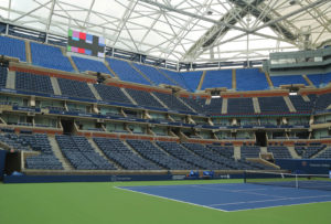 A stand-alone support structure for a retractable roof was completed before the 2015 US Open, but because the roof panels had yet to be installed, a temporary covering was required to avoid shadows on the court.