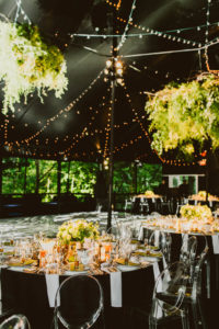 David Beahm Experiences, New York, N.Y., adorned the tent with strings of lights and lush greenery to complete the ambiance of an Italian garden at night. Photos courtesy of Starr Tent.