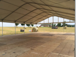 Sitting on a Wenger Strata® floor system, this Arcum structure was used for VIP showers at the Bonnaroo Music and Arts Festival in June in Manchester, Tenn. Photo courtesy of Chattanooga Tent Co.