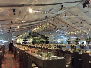 The main dining tent for the 700 guests at the 2016 Swan Ball held in Nashville, Tenn., was a 30-by-35-by-4-meter Losberger P1 clearspan on a BilJax® TF2100 engineered tent floor system that went from 0 to 6 feet high. Photo courtesy of Chattanooga Tent Co. 