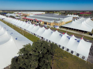 JK Rentals installed tenting totaling 800,000 square feet, including a 60- by-610-foot Anchor Century® tent, for a 12-day-long automobile auction. Photo courtesy of JK Rentals. 
