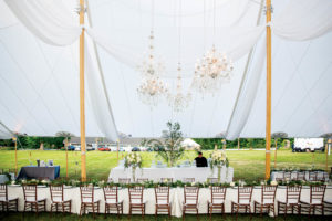 Durkin’s installed this 59-by-99-foot Tidewater sailcloth tent for a wedding with 240 guests in the rolling hills of Litchfield County, Conn. Planning and design: Amy Champagne Events. Photo by Roey Yohai Photography.