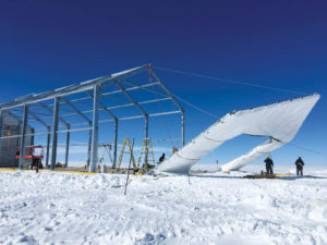 The storage facility built for Summit Station on Greenland’s ice sheet features a wood and metal foundation designed to allow it to slide easily when moved by tractor, freeing it from burying snow drifts. Photos courtesy of Serge Ferrari North America.