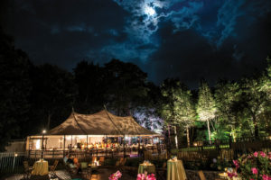 This 44-by-83-foot Stillwater Tent from Fred’s Tents and Canopies lights up the wedding festivities, illuminating the evening sky. Photo courtesy of Stamford Tent & Event Services, Stamford, Conn.